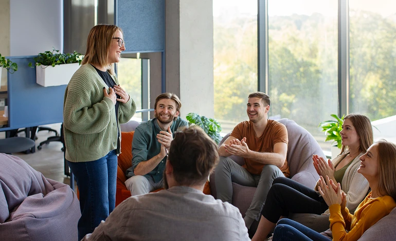 woman taking the lead to speech during the group session